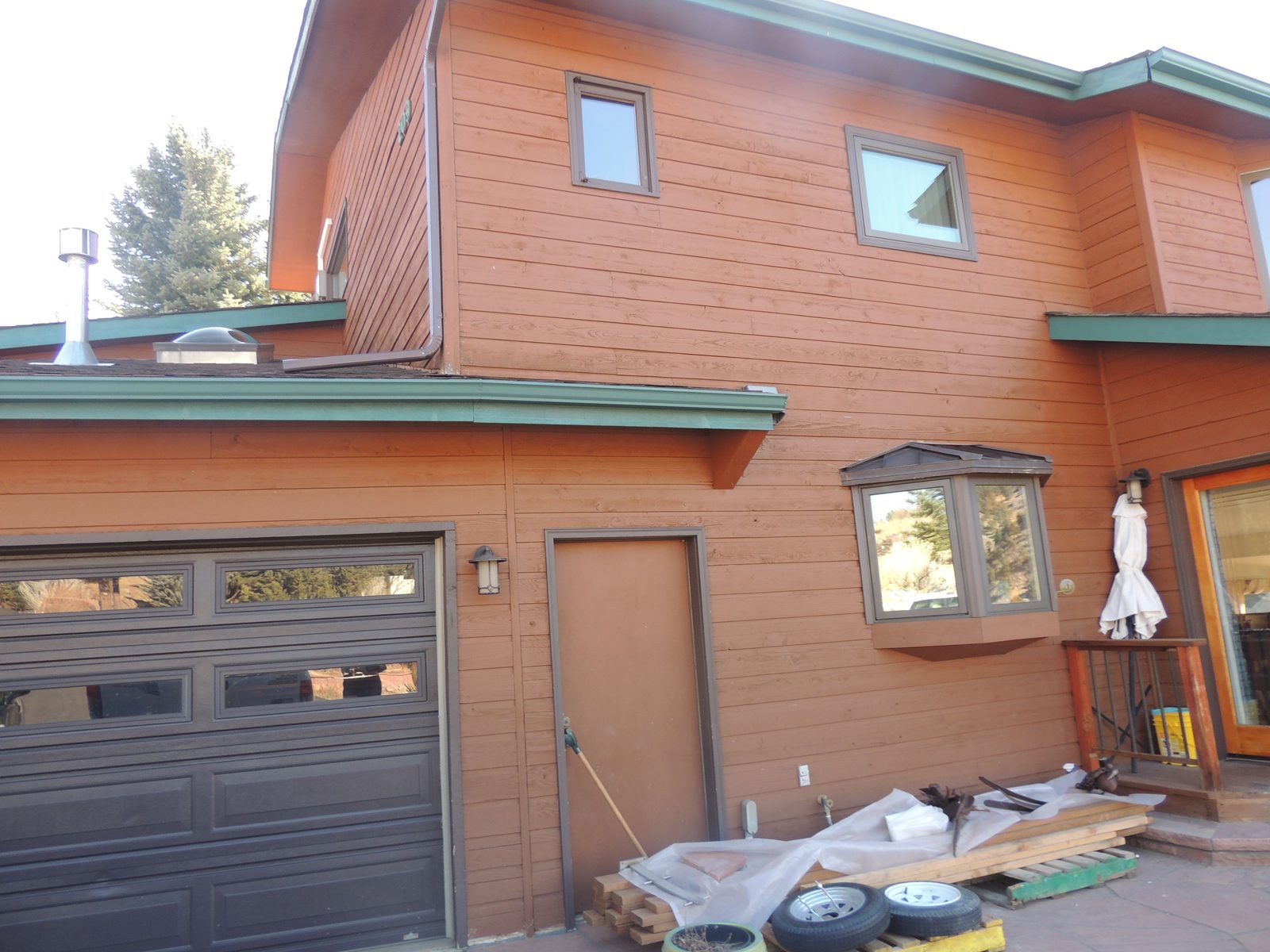 Siding, Roofing & Gutters